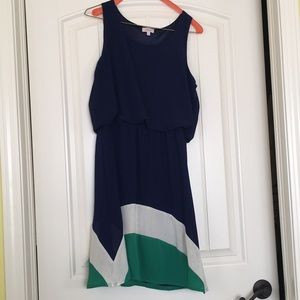 Picket Navy sleeveless dress, knee-length, with a swish of cream & green. NWT, M
